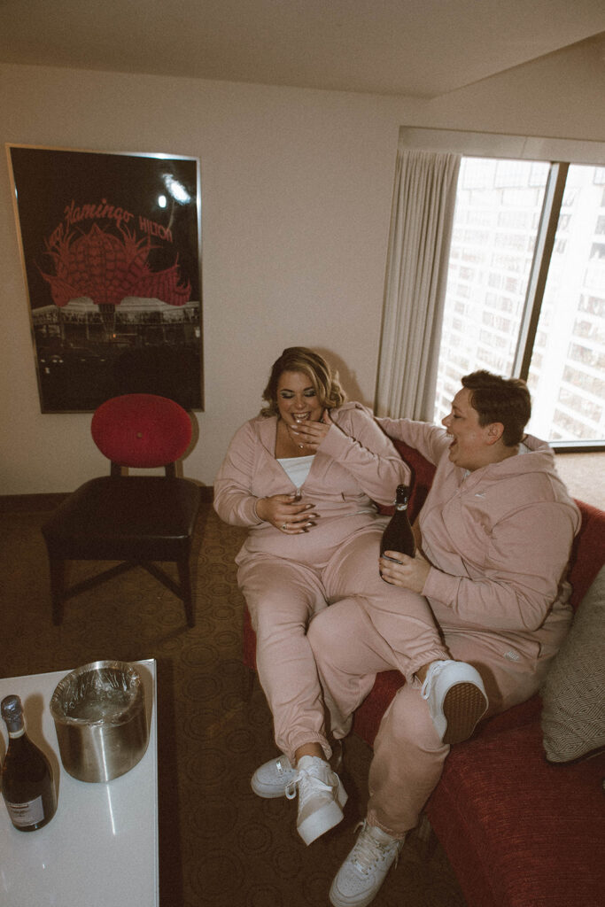 matching pink sweatsuits worn by brides in a very relaxed palm springs chic fashion