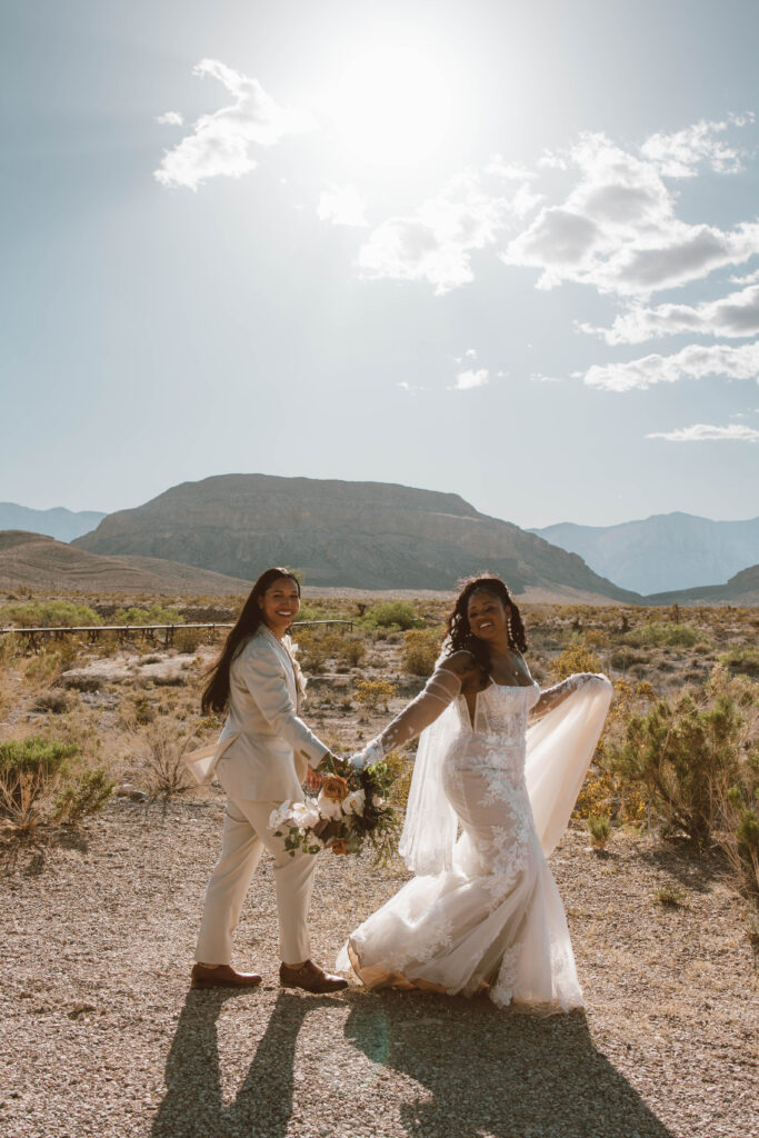 the "follow me" pose with the brides in the desert