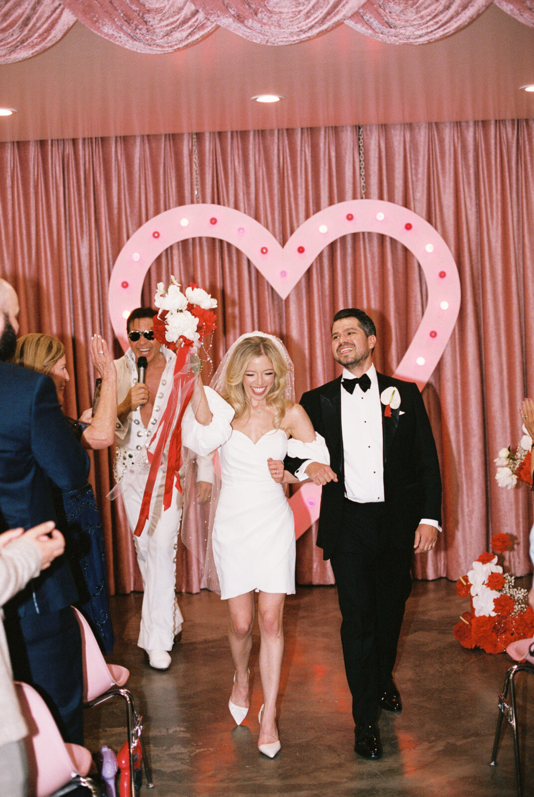 Stacy and Thomas celebrating their wedding at Sure Thing Chapel in Las Vegas